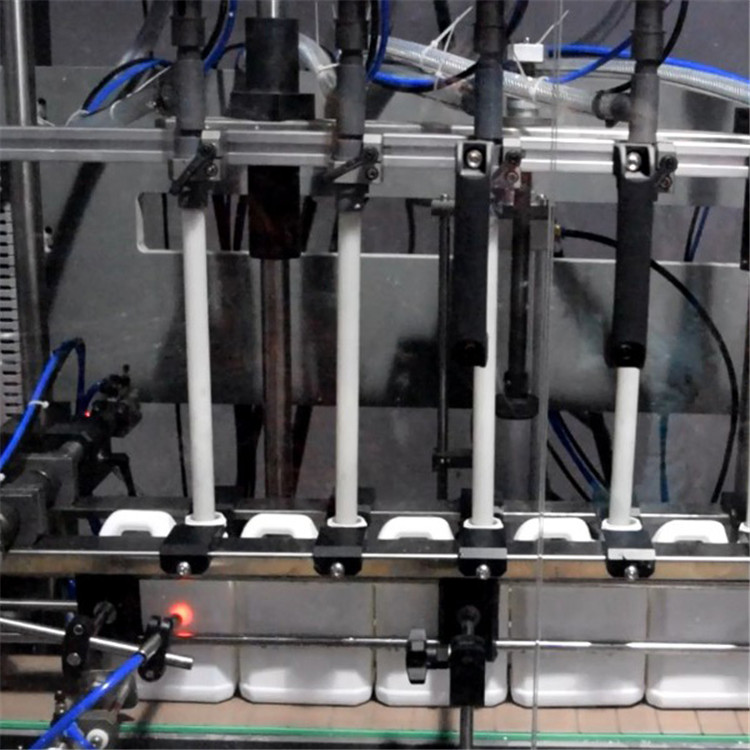 mesin pengisian cairan korosif